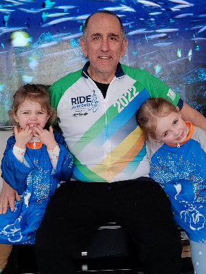 Amelia and Anna are ready to ride with papa in memory of Aunt Casey